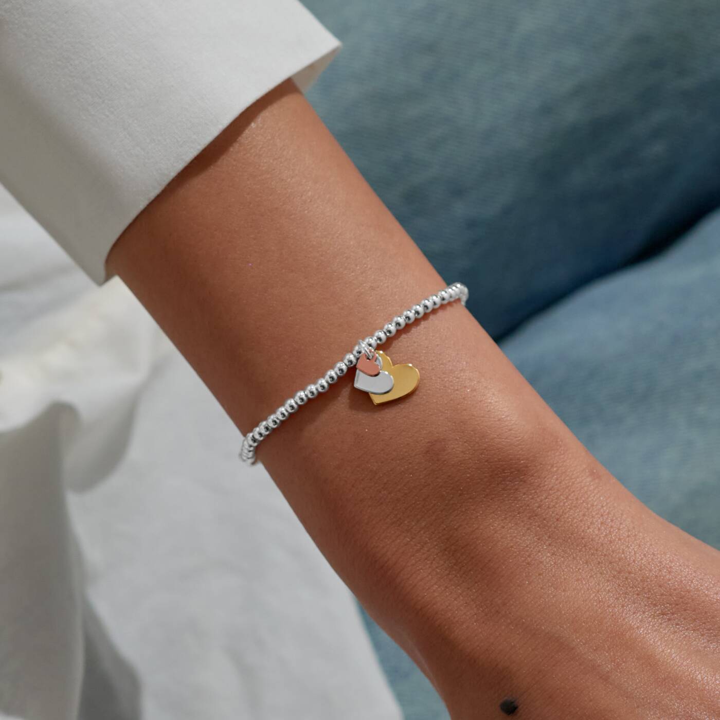 A Littles & Co 'Three Generations' Bracelet In Silver, Gold-Tone, And Rose Gold-Tone Plating