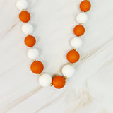 Champion Of The Game Ball Orange Bead Necklace